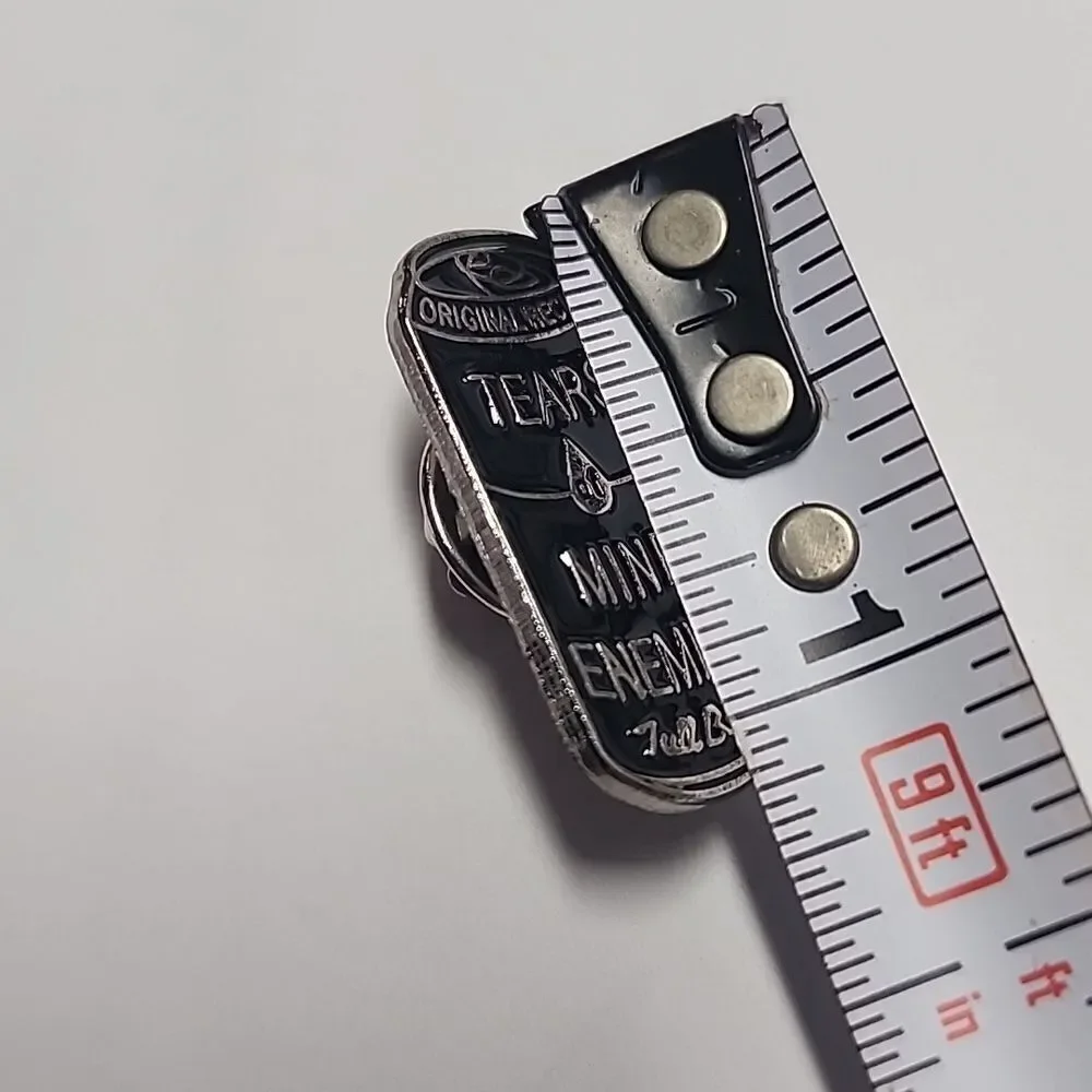 Silver and Black Enamel Pin